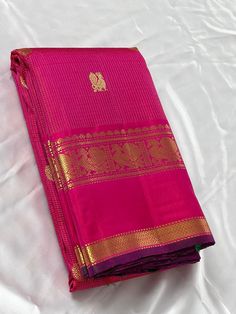 Bridal Collection Pink Color Pure Kanchipuram Silk Saree | Indian Traditional Ethnic Saree | Wedding or Party Wear Saree | Handwoven Gift Saree for Her Product Details : Saree Type : Pure Kanchipuram Silk Saree Golden Zari, Silk Mark Certified Blouse Piece : Yes (Un-Stitched) Saree Length : 5.5 Meters Blouse Piece Length : 80 cm Saree Weight : 0.9 kg Saree Fabric : Pure Kanchipuram Silk  Color : As shown in the picture Work : weaving Pattern : designer Occasion: Party Wear, Formal Wear, Festival Ceremonial Semi-stitched Saree With Self Design, Ceremonial Saree With Self Design For Navratri, Ceremonial Anarkali Pink Saree, Pink Ceremonial Saree For Eid, Ceremonial Pink Tussar Silk Traditional Wear, Ceremonial Pink Saree With Cutdana, Ceremonial Pink Handloom Traditional Wear, Pink Saree With Cutdana For Ceremonial Occasions, Ceremonial Pink Saree With Zari Weaving