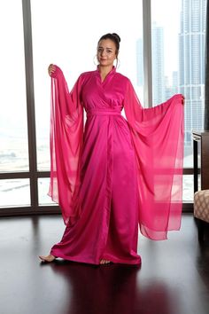 Pink Elegant Robe wide sleeve Elegant V-neck Robe For Evening, Elegant Satin V-neck Kimono, Elegant Silk Dress With Kimono Sleeves, Elegant Maxi Kimono For Wedding, Party Satin Kimono With Satin Finish, Party Satin Finish Kimono, Party Satin Kimono, Elegant Pink V-neck Kimono, Elegant Silk Floor-length Robe