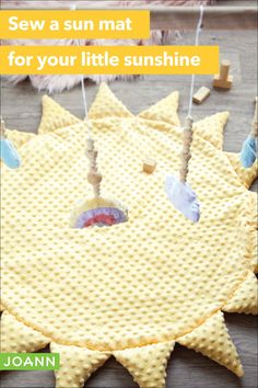 some yellow waffles are hanging from clothes pins with the words sew a sun mat for your little sunshine