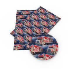 a pile of coasters with the image of trucks on them in red, white and blue