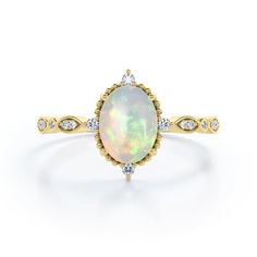 Make every day a cloud nine day with this Antique Design 1.5 Carat Oval Cut Ethiopian Opal And Moissanite Art Deco Five-Stone Engagement Ring In 18K Yellow Gold Plating Over Silver. Skillfully hand-cut into a nice oval cut by our skilled jewelers, this beautiful women's opal jewelry on solid yellow gold plating over silver. Special and non-traditional, this best opal jewelry is well-suited for those who are not quite into normal lifestyle. Reflective properties of this silver and opal jewelry wi Unique Opal, Stone Engagement Rings, Antique Design, Stone Engagement, Romantic Gift, Opal Jewelry, Solid Yellow, 18k Rose Gold, Ethiopian Opal