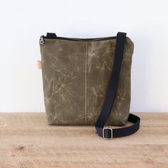 This small to medium size casual crossbody bag is the best purse to help you conquer your busy day! It's big enough to carry all your essentials, including an exterior pocket with a magnetic snap closure. It's perfect for exploring while on vacation, going shopping at the local market, and of course for just looking and feeling your most awesome self!   The exterior is made of 13 oz waxed cotton canvas, which acts as a natural water repellent, so you'll love having it by your side rain or shine. Going Shopping, Casual Crossbody Bag, Best Purses, Purse For Women, Local Market, Travel Hiking, Canvas Crossbody Bag, Antique Brass Hardware, Natural Cream