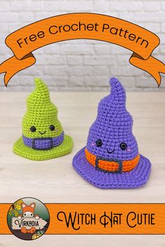 two crocheted witches sitting next to each other