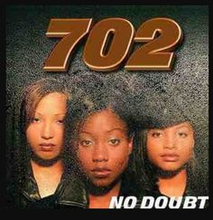 the album cover for 702, featuring three women in front of a black background