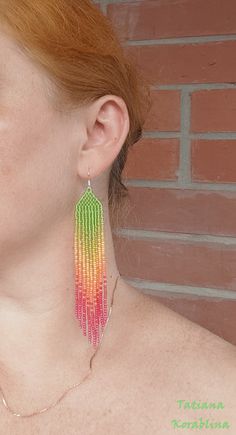 These handmade unique earrings are made of high-quality Czech beads and strong synthetic thread. I use my author's scheme. They are elegant, fashionable, and highly versatile, suitable for everyday wear. There may be some color discrepancies which is due to the different monitor settings. 100% hand made with love! Measurements: Length-about 12cm (4.72 inch) Width -about 2 cm (0.8 inch) Materials: Sterling silver components Czech glass beads Strong bead weaving thread Rainbow Dangle Beaded Earrings Handmade, Handmade Rainbow Beaded Dangle Earrings, Rainbow Handmade Beaded Dangle Earrings, Handmade Multicolor Long Drop Chandelier Earrings, Multicolor Handmade Long Drop Chandelier Earrings, Colorful Handmade Dangle Tassel Earrings, Chandelier Boho, Red Chandelier, Earrings Chandelier