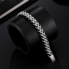 Upgrade your accessory game with our FZ Stainless Steel Chain Leather Punk Biker Bracelet. Made with high-quality materials, this bracelet exudes style and fashion. Elevate your look and make a statement with this edgy and trendy piece. Bracelets Type: Chain & Link Bracelets Gender: Men Metals Type: STAINLESS STEEL Fine or Fashion: fashion Style: TRENDY Material: Metal Chain Type: Link Chain Item Type: BRACELETS Compatibility: All Compatible Shape\pattern: Geometric Clasp Type: MAGNET Length : 19-21-23CM（Customized） Material : Stainless Steel Metal Punk Style Chain Bracelet, Punk Style Metal Bracelets, Punk Stainless Steel Bracelets For Streetwear, Silver Punk Bracelet For Streetwear, Edgy Metal Chain Bracelets, Viking Wolf, Biker Bracelet, Mens Designer Hoodies, Mens Work Shoes