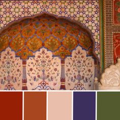 an ornate wall with many different colors