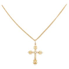 This gorgeous, intricate diamond cross pendant is a stunning and striking design. The cross pendant is made in 18 karat yellow gold with genuine, natural diamonds. The cross design has handmade beading and milgrain texture that balances the pave diamonds set on top. The cross has a bail that also has diamonds pave set across the top! This pendant is on an 18 inch cable chain that compliments the cross pendant perfectly. 18 Karat Yellow Gold 0.32 carat total diamond weight, VS-2 clarity, G-H colo Luxury Fine Jewelry Cross Necklace, Luxury Cross Jewelry With Pave Setting, Luxury Cross Pendant Jewelry With Pave Setting, Luxury Diamond Accents Cross Necklace, Classic Luxury Yellow Gold Cross Necklace, Luxury Cross Necklace With Diamond Accents, Luxury Pendant Cross Necklace With Diamond Accents, Luxury Gold Diamond Cross Pendant Necklace, Luxury Cross Pendant Necklace With Diamond Accents