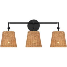 three light bathroom fixture with wicker shades and black metal frame, on an isolated white background