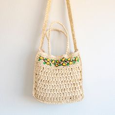 IN STOCK NOW SHIPPING FROM LOS ANGELES Elevate your summer fashion with the Elena Handbags Summer Floral Straw Shoulder Bag. The square shape and lightweight straw material combine for a chic and effortless look. Versatile as both a shoulder bag and crossbody, it features a top handle and long strap for added convenience. Adorned with a beautiful floral design, this bag is the perfect addition to any outfit. Magnetic button closure Fully lined with inner pocket Size: 11"H x 11"W x 4"D Drop length 24 inches Designer Style ID: 8644 Beige Rectangular Straw Bag For Vacation, Rectangular Beige Straw Bag For Vacation, Cream Rectangular Shoulder Bag For Summer, Casual Yellow Crochet Woven Bag, Casual Beige Square Straw Bag, Cream Straw Summer Shoulder Bag, Summer Woven Square Shoulder Bag, Trendy Square Shoulder Bag For Beach, Summer Square Woven Shoulder Bag