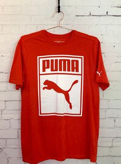 Puma Logo Crew Neck Top For Streetwear, Short Sleeve Puma Tops For Streetwear, Cheap Red Y2k Style T-shirt, Puma Logo Graphic Tee With Crew Neck, Crew Neck Puma Logo Tops For Streetwear, Puma Graphic Tee With Crew Neck, Red Graphic Tee For Sports, Sporty Puma Logo Tops For Sports, Red Y2k T-shirt For Streetwear