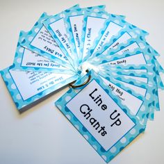 blue and white tags with words on them