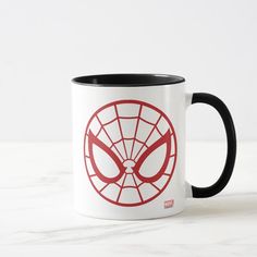 a spider - man logo on a white and black coffee mug