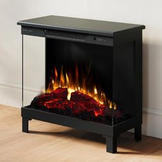 an electric fireplace with fire flames in it