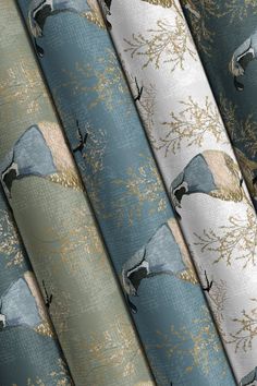 a bunch of different types of fabric with birds on them