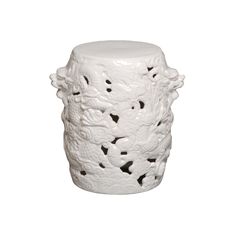 a white vase with intricate designs on it