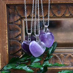 This necklace is made from an amethyst stone which has been cut into an heart. The stone hangs from a silver plated chain. You can choose the length of the necklace you prefer. You will get a necklace at random. Please note that all necklaces are handmade and may differ from the pictured. The picture shows multiple necklaces. You will receive one necklace with one pendant. Ewelina Pas Jewelry Heart Pendant Crystal Necklace With Natural Stones, Valentine's Day Amethyst Heart Necklace, Heart Shaped Stone Necklaces For Gifts, Heart-shaped Natural Stones Necklaces For Jewelry Making, Purple Heart Amethyst Necklace, Purple Amethyst Heart Necklace, Purple Heart-shaped Amethyst Necklaces, Purple Amethyst Heart Necklaces, Purple Amethyst Heart Pendant Necklace