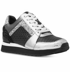 New Michael Kors BILLIE TRAINER Lace Up Sneakers Women's Shoes  Color: Black/Silver Billie trainers are a sport-luxe essential. Wear them with everything from T-shirt dresses to denim for a casually cool look. • 90% Polyester/5% Metallic Yarn/5% Elastic • Sole: Rubber • Almond Toe • Lace-Up Fastening • Imported All items are shipped within 24 Hours of processing your cleared payment   Authenticity 100% Guaranteed! Please bid with confidence, all our items are from Michael Kors Stores, Coach Stor Metallic Sneakers With Perforations And Round Toe, Metallic Sneakers With Perforations, Silver Casual Sneakers With Metallic Logo, Michael Kors Sporty Sneakers For Streetwear, Sporty Silver Sneakers With Laces, Casual Metallic Sneakers With Perforated Toe Box, Sporty Silver Leather Sneakers, Silver Lace-up Sneakers With Metallic Logo, Michael Kors Low-top Sports Sneakers