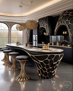 an elegant kitchen with black and gold decor