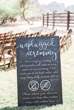 an unplugged ceremony sign in front of rows of chairs