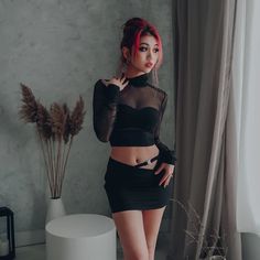 This simple and plain black micro skirt is designed with comfort and protection in mind, featuring hidden shorts underneath. Women's Streetwear Fashion, Turtleneck Crop Top, Mesh Turtleneck, Turtle Neck Crop Top, Micro Skirt, Asymmetrical Tops, Edgy Look, Black Mini Skirt, Urban Outfits