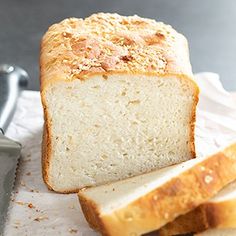 a loaf of bread sitting on top of a cutting board