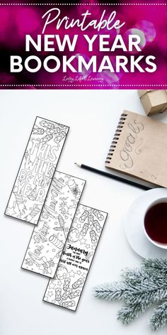 the printable new year bookmarks are next to a cup of coffee