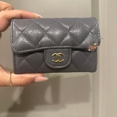 Chanel Wallet In Gray Caviar Leather With Gold Hardware It’s Obviously Got Damage To It.. It Can Definitely Be Repaired By A Leather Surgeon But I’m Not Willing To Do It. It Is Priced Accordingly. Retail Is $725 Will Include Original Box And Receipt Luxury Bifold Coin Purse With Coin Pocket, Luxury Compact Travel Coin Purse, Designer Compact Coin Purse For Travel, Luxury Bifold Coin Purse For Travel, Gray Travel Bags With Card Slots, Luxury Compact Trifold Wallet For Everyday Use, Luxury Wallet With Interior Key Chain Holder, Luxury Bifold Wallets With Removable Pouch, Elegant Bifold Coin Purse With Removable Pouch