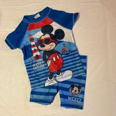 Disney Mickey Mouse Swim Shirt And Swim Shorts Set 1928 Mickey Mouse At The Beach With Sunglasses-Very Cute! Never Worn! Blue Character Print Playwear Sets, Blue Character Print Sets For Playwear, Blue Playful Character Print Sets, Cute Blue Sets With Character Print, Casual Mickey Mouse Tops For Playwear, Casual Mickey Mouse Playtime Set, Disney Blue Summer Tops, Playful Blue Short Sets, Playful Blue Mickey Mouse Top