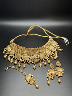 This South Indian Necklace Set Has A Beautiful And Lavish Appearance| Necklace & Earrings Set |  South Indian Choker Traditional Set Perfect Wedding Gift | Festival Special Jewelry | Kempu Temple Jewelry Set | Long Gold Necklace Set | Indian Necklaces are known for their delicate designs. Gold Dual-tone Temple Jewelry Sets, Luxury Traditional Brass Temple Necklace, Traditional Yellow Gold Peacock Necklace, Elephant Necklace Gold Indian, Gold Dual-tone Bollywood Necklace, Elephant Jewelry Necklace, Indian Choker, Temple Jewelry, Necklace Set Indian