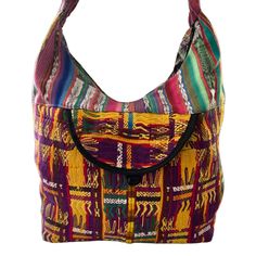 Huipil Hobo Bag handmade by Guatemalan artisans made from a repurposed "Huipil", a traditional Mayan blouse used by Guatemalan women. Fully lined with a zip top and one front pocket. perfect as travel bag, very roomy and lightweight.Details: 100% cotton textiles made entirely by hand in GuatemalaBlack lining Approximate size dimensions: 15.5"x15.5"Padded handle Up-cycled vintage embroidery in the front and backZipper ClosureFront pocket When buying up-cycle vintage clothing, many times you will Bohemian Multicolor Shoulder Bag For Trip, Traditional Hobo Shoulder Bag For Everyday Use, Bohemian Reversible Hobo Bag For Travel, Traditional Fair Trade Shoulder Bag For Travel, Traditional Travel Shoulder Bag, Traditional Handwoven Hobo Bag For Travel, Multicolor Bohemian Shoulder Canvas Bag, Bohemian Upcycled Multicolor Shoulder Bag, Bohemian Multicolor Fabric Shoulder Bag