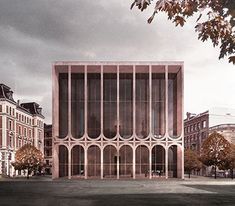 an architectural rendering of a building in the middle of a street with trees and buildings around it