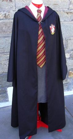 a harry potter robe and tie on display