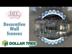 the diy project - decorative wall stones with dollar tree logo in front of it