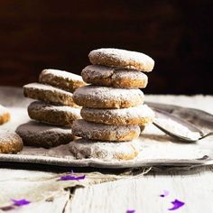 a stack of doughnuts sitting on top of a plate