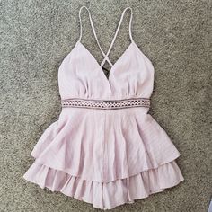 Forever 21 Nwt Flowy Camisole Romper Size: Large Color: Mauve Fabric Has A Gauze Texture, Color Is More Of A Light Purple Than Pink Bottom Is Flowy Like A Skirt, And Hardly Even Looks Like There's Shorts! Cinches In At The Waist With Tie-Back This Romper Is So Cute, I Just Haven't Had Any Occasions To Wear It To! Offers Are Welcome! Chic Cami Jumpsuits And Rompers For Spring, Feminine Sleeveless Jumpsuits And Rompers For Day Out, Spring Vacation Cami Jumpsuits And Rompers, Feminine Sleeveless Jumpsuits And Rompers For Brunch, Summer Cotton Jumpsuits And Rompers For Night Out, Cotton Jumpsuits And Rompers For Summer Nights, Feminine Sleeveless Jumpsuits For Brunch, Trendy Sleeveless Jumpsuits And Rompers For Brunch, Trendy Sleeveless Jumpsuit For Brunch