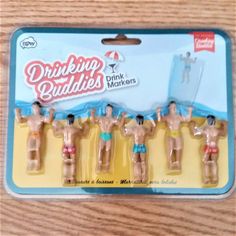 six plastic figurines of men in bathing suits