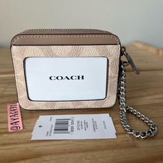 100% Authentic Brand New With Tags Comes In Original Packaging Cw883 Signature Zip Card Case Sand/Taupe And Silver Hardware 4 1/8” L X 3 1/4” H Coach Rectangular Card Holder With Id Window, Coach Rectangular Card Holder For Everyday, Coach Rectangular Everyday Wallets, Coach Card Holder With Id Window For Everyday Use, Coach Coin Purse With Card Slots For Everyday Use, Coach Wallet With Interior Card Slots For Everyday Use, Coach Wallets With Interior Card Slots For Everyday, Coach Rectangular Bags With Card Slots, Everyday Rectangular Bag With Id Window