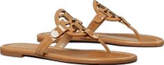 Classic Tan Sandals For Spring, Classic Tan Sandals With Leather Lining, Classic Beige Sandals For Spring, Classic Tan Sandals For Summer, Classic Tan Sandals With Leather Sole, Classic Tan Slip-on Sandals, Luxury Tan Sandals For Spring, Casual Flat Sandals With Leather Lining, Classic Flat Heel Sandals For Spring