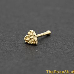 3.5mm Tiny Nugget Heart 14K Solid Gold Nose Bone Ball End Stud Metal: Solid 14K Yellow Gold Metal Stamp: 14K Finish: Polished Disc Size: 3.5mm Thickness: 0.6mm / 22 Gauge Post Length: 6mm Backing: Ball End Stud *Nickel FREE* It comes with a gift box. Ready for gifting Please read our shop policy before placing your order Thank you for visiting our shop Nose Piercing Unique, Cute Nose Piercing Jewelry, Gold Nose Piercing, Nostril Stud, Stud Nose Piercing, Gold Nugget Jewelry, Nose Ring Gold, Nose Bone Stud, Xoxo Jewelry