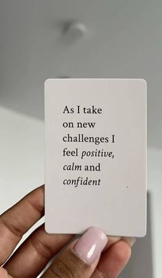 someone is holding up a card that says as i take on new challenges i feel positive, calm and confident