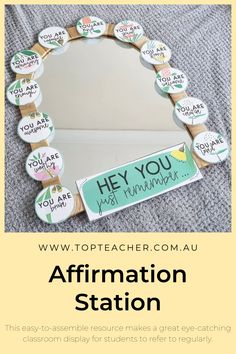 an affirmation station with the words hey you are in front of it and there is