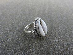 silver ring with kaurishell ❖ material ❖925 sterling silver❖ size ❖shell: 20 mm x 14 mm Silver Shell-shaped Ring For Gift, Silver Shell Rings For Gift, Silver Shell Rings For Beach, Silver Shell-shaped Rings For Beach, Small Dress, Rings Statement, Statement Rings, Silver Ring, Gemstone Rings