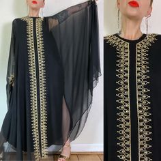 Oh Georgie. Absolutely phenomenal Vintage 1960's black silk chiffon Georgie Keyloun caftan dress adorned in metallic gold rope & prong set rhinestones, with the most magical wingspan. Seasonless for the eternal witch.   Marked a vintage L  Fits a range (I'm about a M), but please use measurements as fit guide - measurements taken from underlayer 16" shoulder 22.5" bust (on the half)  22.5" waist (on the half)  23" hip (on the half)  55" length  57"-59" exterior length estimate  Underlayer - blac Evening Embellished Silk Kaftan, Evening Silk Embellished Kaftan, Silk Embellished Kaftan For Parties, Fitted Evening Kaftan For Eid, Long Kaftan With Gold Embroidery For Party, Bohemian Black Evening Abaya, Embroidered Fitted Evening Kaftan, Evening Embroidered Fitted Kaftan, Fitted Embroidered Kaftan For Evening