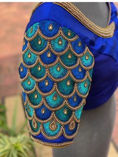 Green Art Silk Blouse With Intricate Embroidery, Bollywood Traditional Wear With Peacock Design, Blue Anarkali Blouse With Intricate Embroidery, Diwali Designer Traditional Wear With Peacock Design, Blue Blouse With Intricate Embroidery For Festivals, Blue Bollywood Traditional Wear With Handwork, Festive Blue Lehenga With Handwork, Designer Peacock Design Traditional Saree, Blue Traditional Wear With Handwork For Festive Occasions