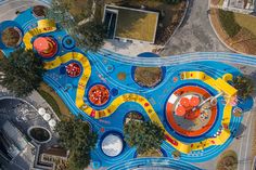 an aerial view of a colorful playground