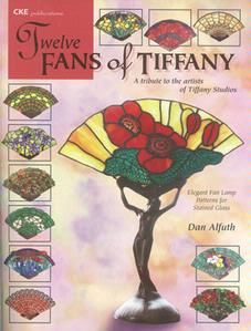 the fan of tiffany book is shown in red and green colors with pictures of flowers on it