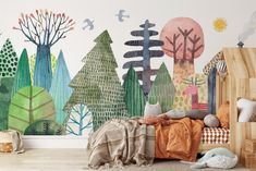 a child's room with a mural on the wall