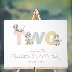 a sign that says, two welcome to charlotte's 2nd birthday with mickey mouse