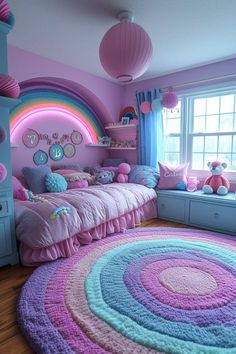 a bedroom with pink, blue and purple decor on the walls is decorated in pastel colors